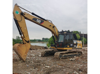 CATERPILLAR 323DL Kettenbagger