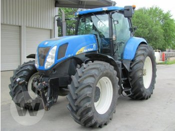 Traktor New Holland T 7040: das Bild 1