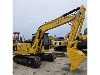 Bagger KOMATSU PC110: das Bild 3 Bagger KOMATSU PC110: das Bild 3