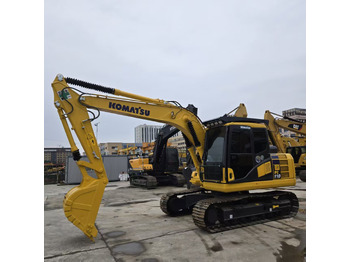 Bagger KOMATSU PC110: das Bild 5 Bagger KOMATSU PC110: das Bild 5