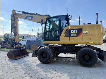 CAT M318F  – Leasing CAT M318F: das Bild 1