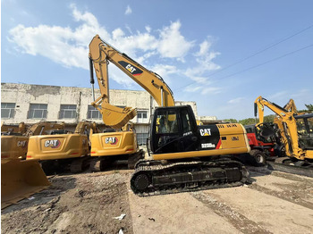 CATERPILLAR 323 Bagger