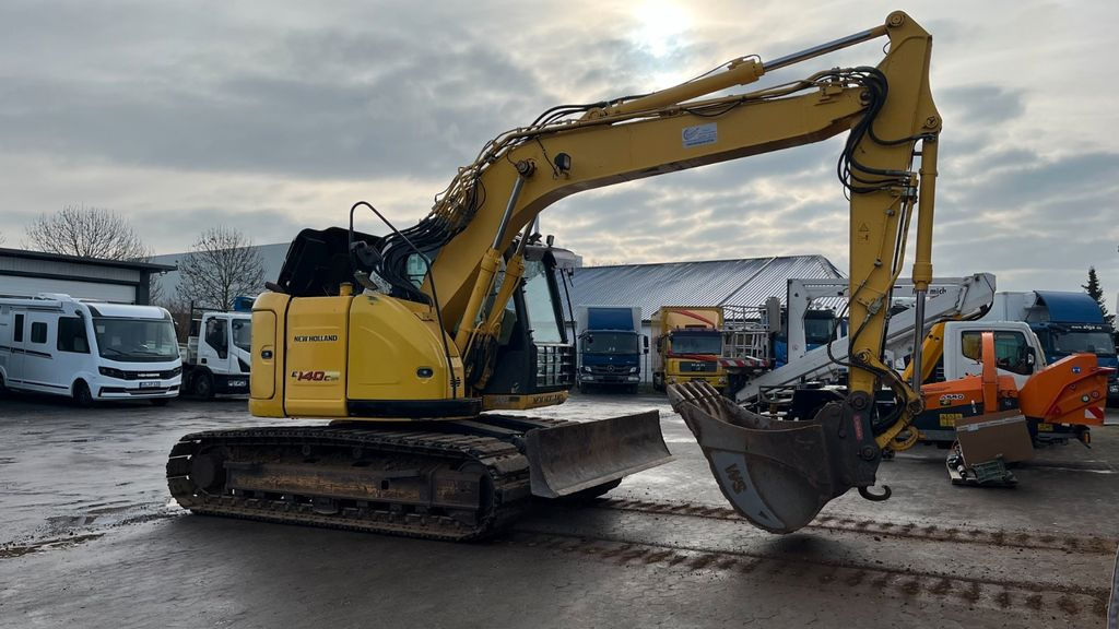 New Holland E140CSR Kettenbagger 16.000 Kg Motorschaden - Kettenbagger: das Bild 4 New Holland E140CSR Kettenbagger 16.000 Kg Motorschaden - Kettenbagger: das Bild 4
