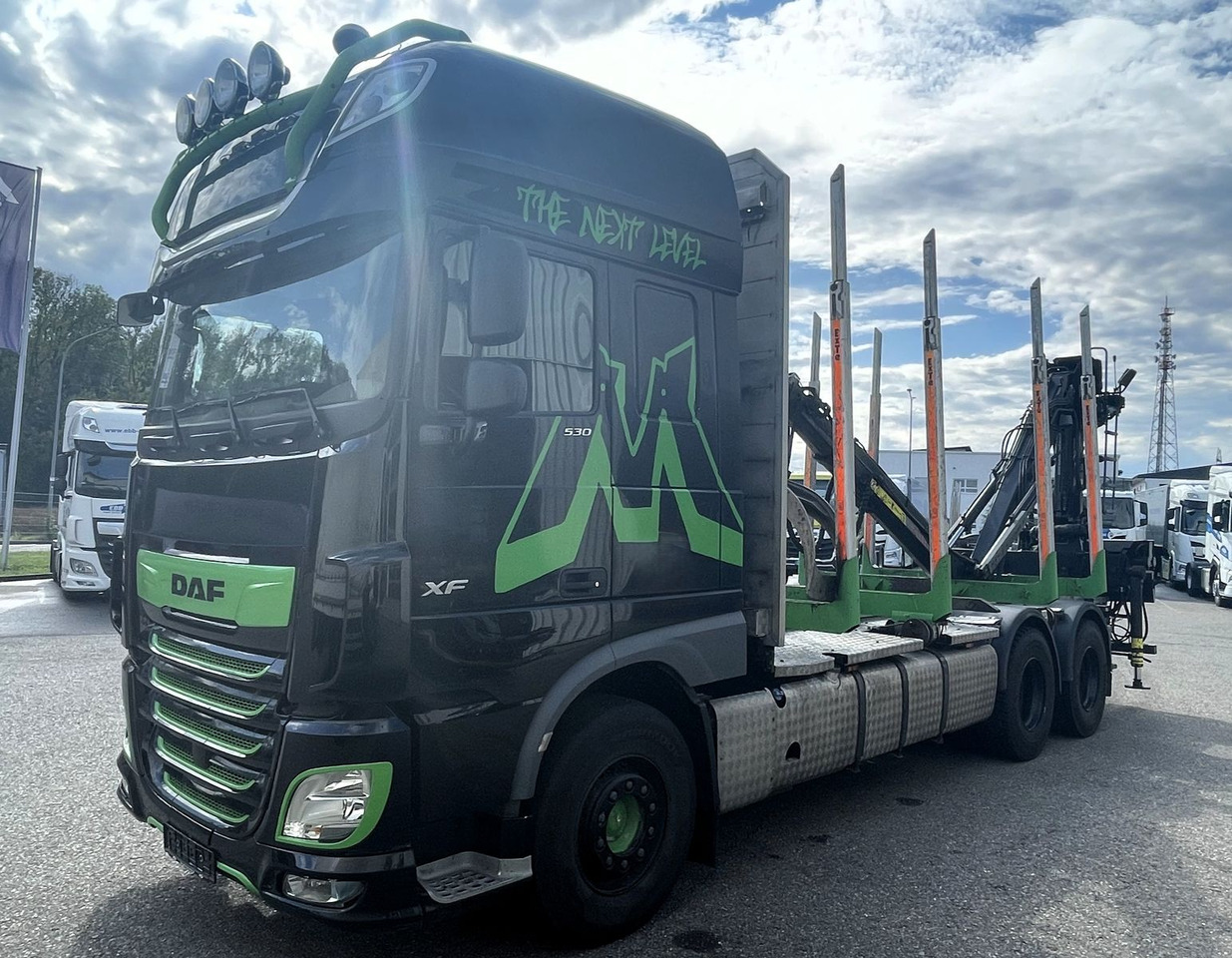 DAF FAT XF 530 SSC, Holztransport, Greifer mit Säge - Holztransporter, Autokran: das Bild 2 DAF FAT XF 530 SSC, Holztransport, Greifer mit Säge - Holztransporter, Autokran: das Bild 2