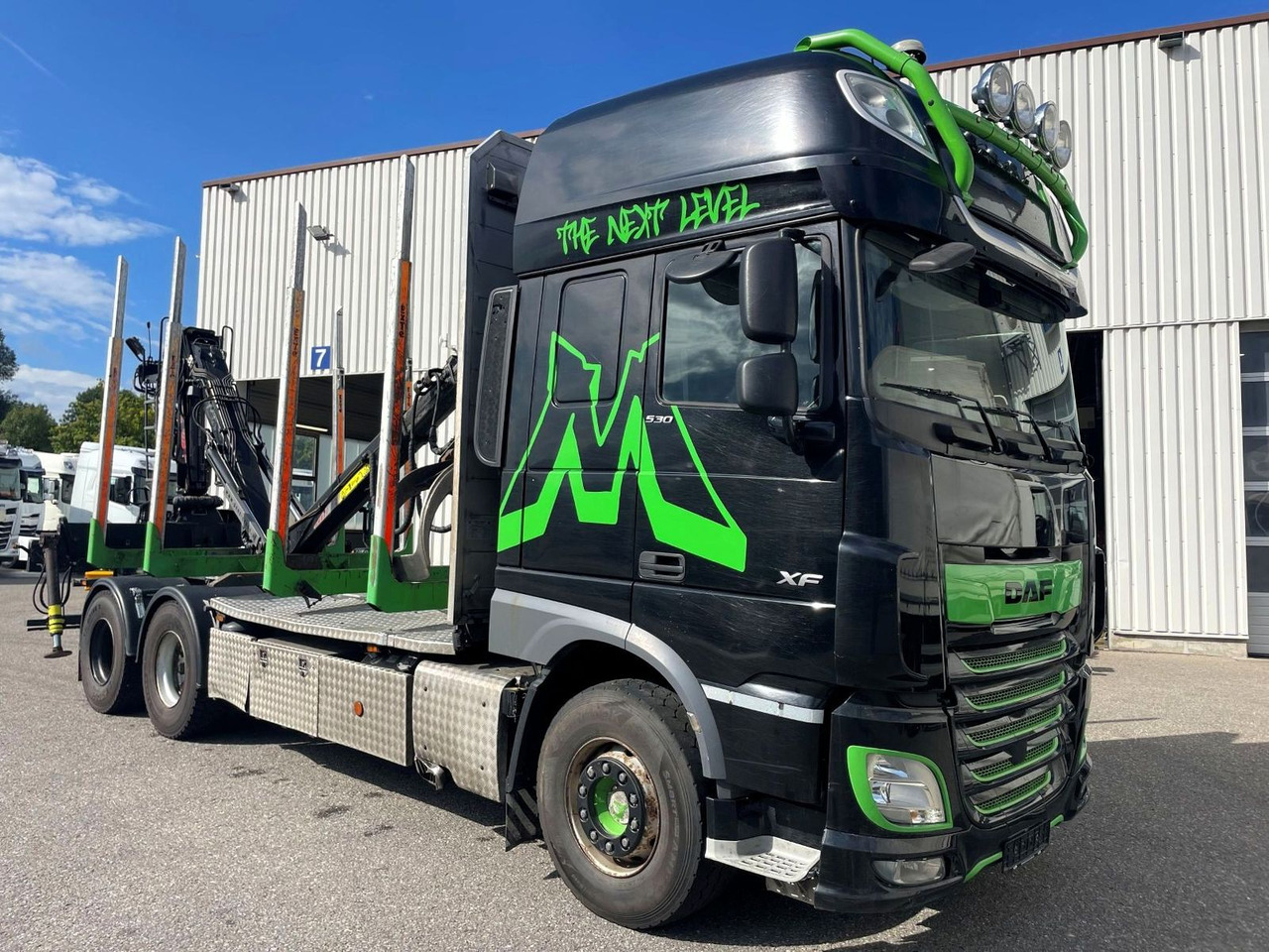DAF FAT XF 530 SSC, Holztransport, Greifer mit Säge - Holztransporter, Autokran: das Bild 1 DAF FAT XF 530 SSC, Holztransport, Greifer mit Säge - Holztransporter, Autokran: das Bild 1