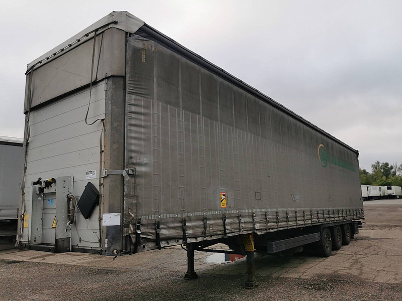 Schmitz Cargobull SCS SCB MEGA VARIO HUBDACH - Planenauflieger: das Bild 1 Schmitz Cargobull SCS SCB MEGA VARIO HUBDACH - Planenauflieger: das Bild 1