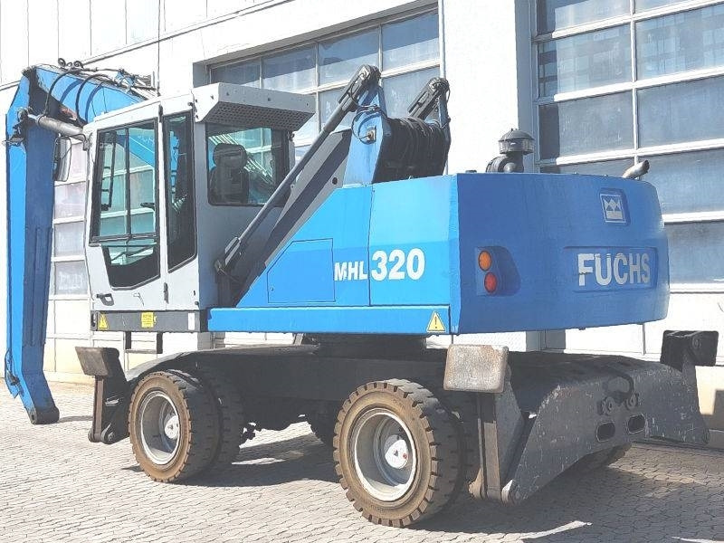 Fuchs MHL 320 D - Umschlagbagger: das Bild 3 Fuchs MHL 320 D - Umschlagbagger: das Bild 3
