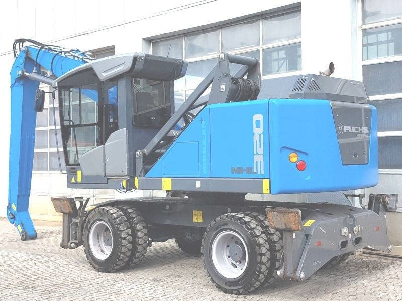 Fuchs MHL 320 F - Umschlagbagger: das Bild 3 Fuchs MHL 320 F - Umschlagbagger: das Bild 3