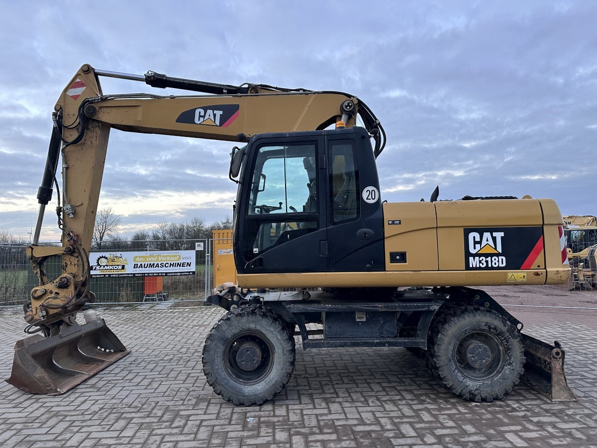 CATERPILLAR M 318 D full Hydr. Top Zustand German machine ! - Mobilbagger: das Bild 1 CATERPILLAR M 318 D full Hydr. Top Zustand German machine ! - Mobilbagger: das Bild 1