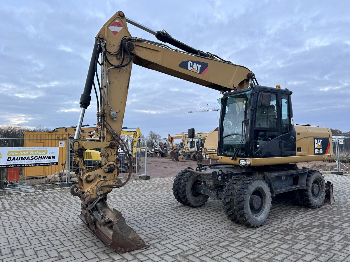 CATERPILLAR M 318 D full Hydr. Top Zustand German machine ! - Mobilbagger: das Bild 4 CATERPILLAR M 318 D full Hydr. Top Zustand German machine ! - Mobilbagger: das Bild 4