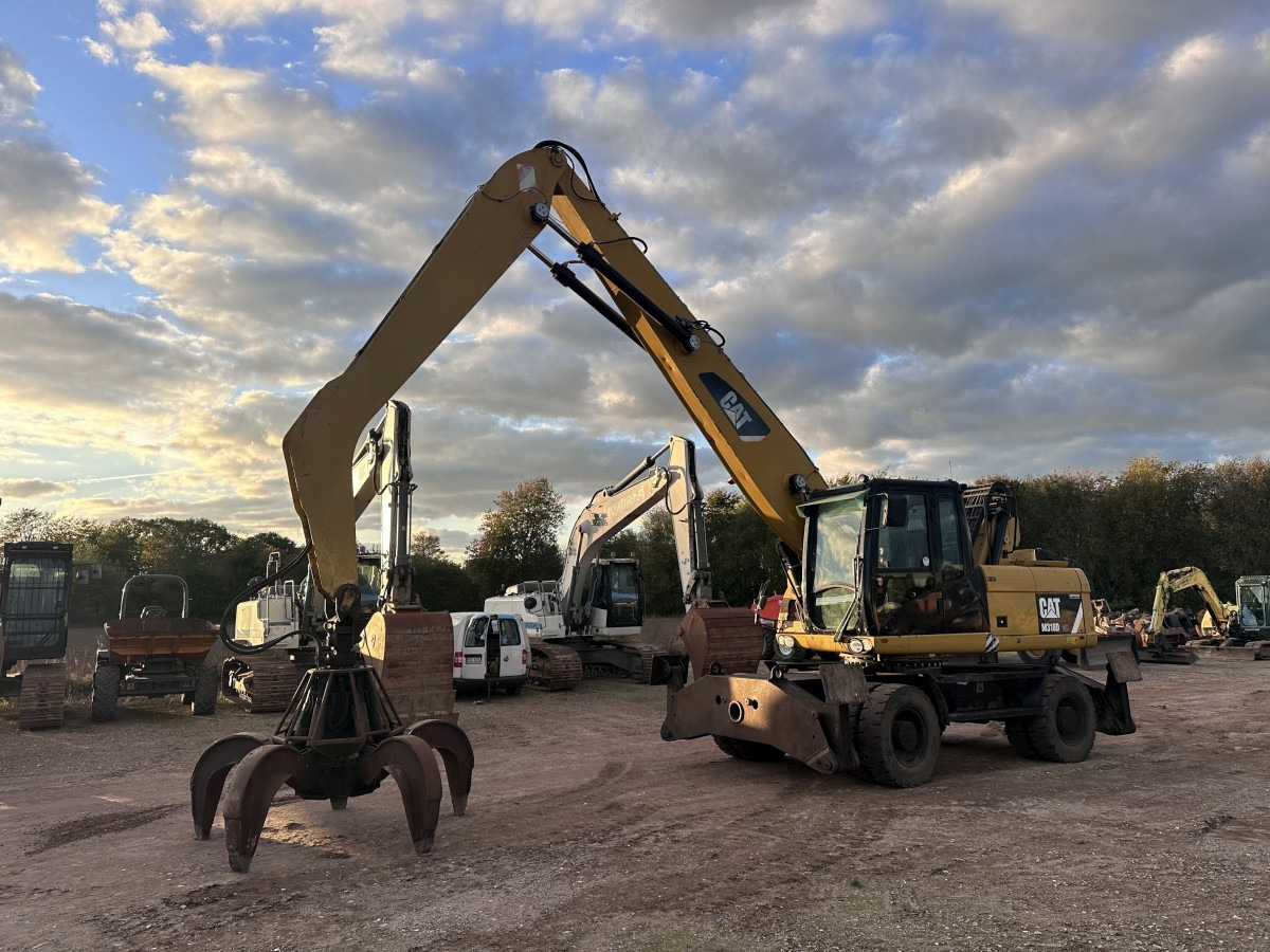 CATERPILLAR M 318 MH mit Greifer Kein 3022 3026 320 322 - Umschlagbagger: das Bild 1 CATERPILLAR M 318 MH mit Greifer Kein 3022 3026 320 322 - Umschlagbagger: das Bild 1