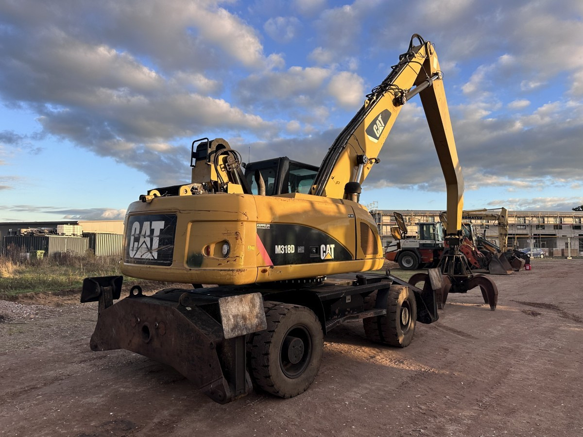 CATERPILLAR M 318 MH mit Greifer Kein 3022 3026 320 322 - Mobilbagger: das Bild 3 CATERPILLAR M 318 MH mit Greifer Kein 3022 3026 320 322 - Mobilbagger: das Bild 3
