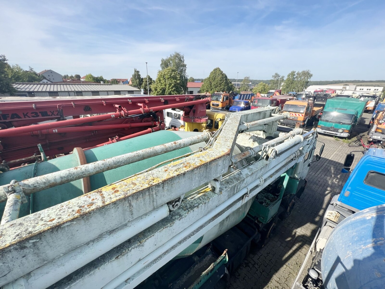 MAN 33.292 8x4 33.292 8x4 Mischer Stetter 7m³ mit Pumpe Schwing 21m, 6-Zylinder - Fahrmischer: das Bild 4 MAN 33.292 8x4 33.292 8x4 Mischer Stetter 7m³ mit Pumpe Schwing 21m, 6-Zylinder - Fahrmischer: das Bild 4