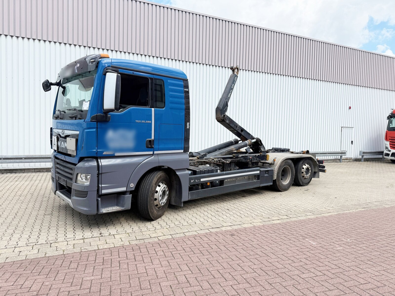 MAN TGX 26.580 6x2-4 BL TGX 26.580 6x2-4 BL, Intarder, Lenk-/Liftachse, Funk - Abrollkipper: das Bild 1 MAN TGX 26.580 6x2-4 BL TGX 26.580 6x2-4 BL, Intarder, Lenk-/Liftachse, Funk - Abrollkipper: das Bild 1