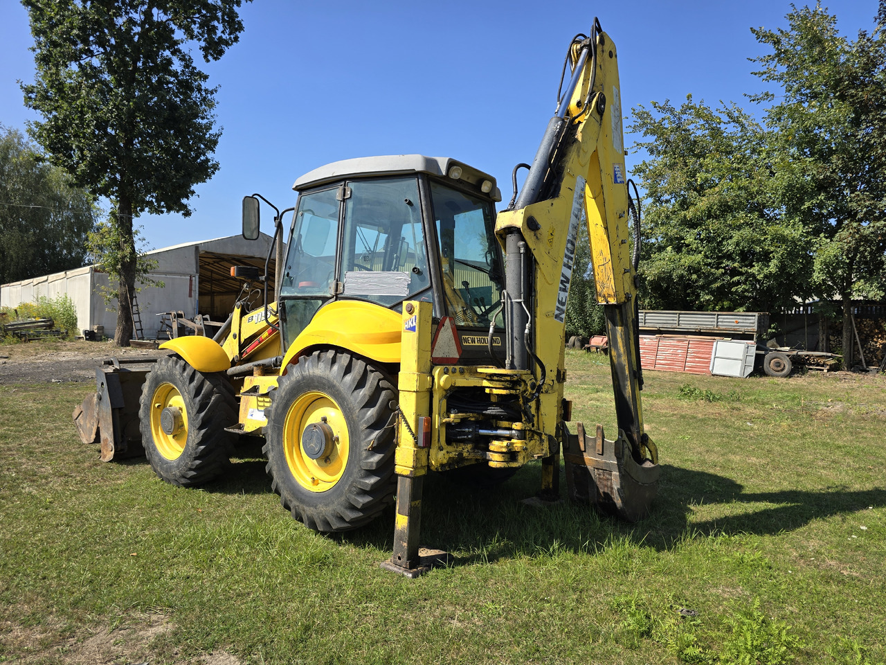 NEW HOLLAND B115-4PS - Baggerlader: das Bild 4 NEW HOLLAND B115-4PS - Baggerlader: das Bild 4