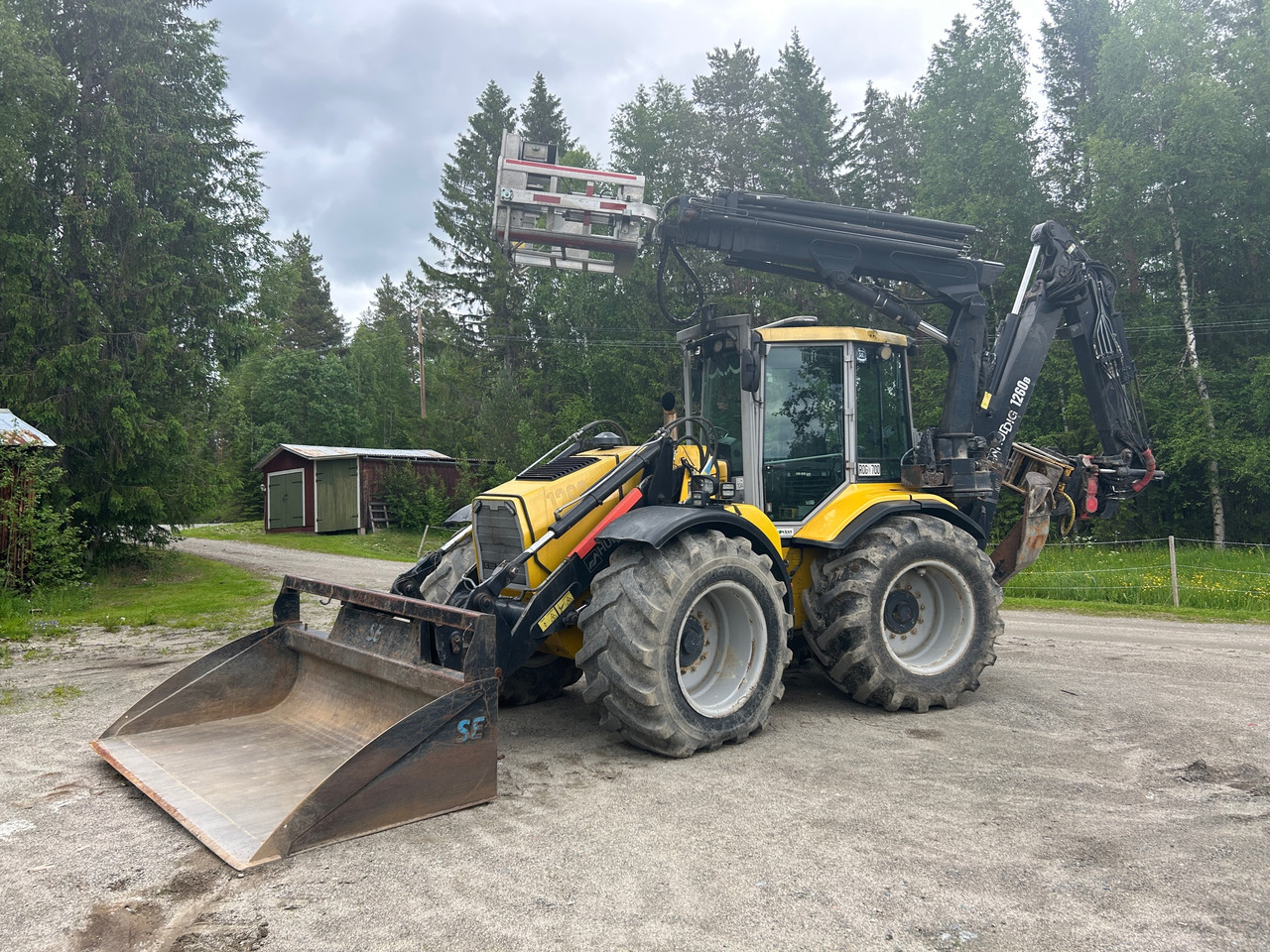 Huddig 1260B - Baggerlader: das Bild 1 Huddig 1260B - Baggerlader: das Bild 1