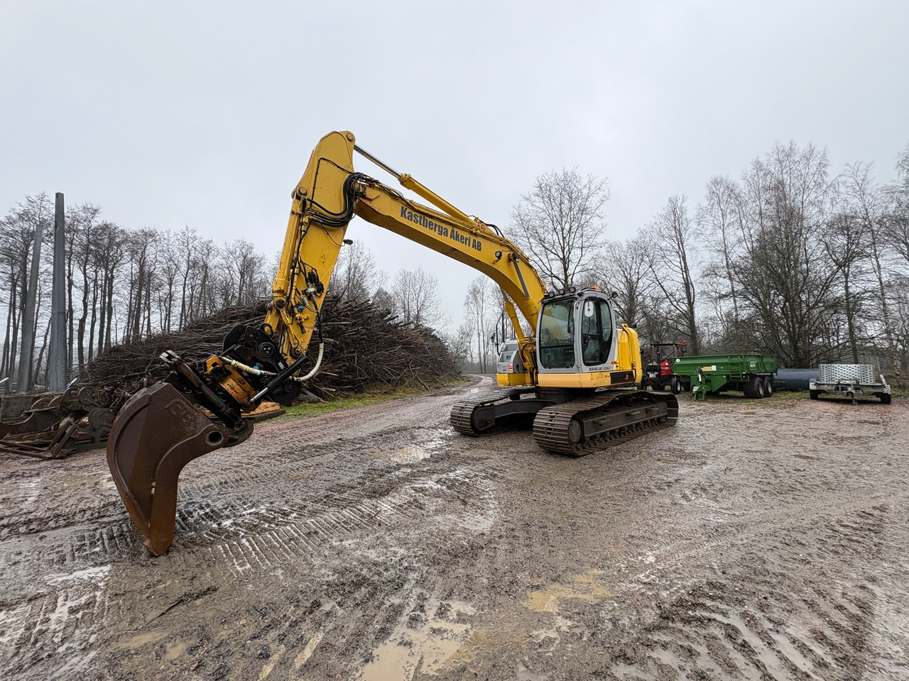 New Holland / Kobelco E 235 SR - Bagger: das Bild 1 New Holland / Kobelco E 235 SR - Bagger: das Bild 1