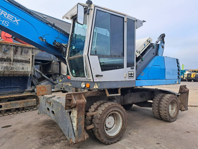 Fuchs MHL 335 - Umschlagbagger: das Bild 4 Fuchs MHL 335 - Umschlagbagger: das Bild 4