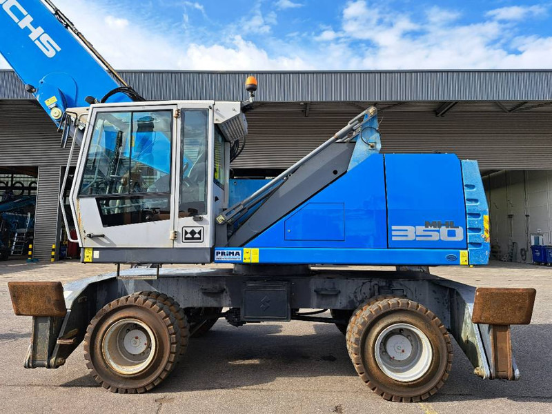 Umschlagbagger Für die Beförderung von Müll Fuchs MHL 350 E: das Bild 7