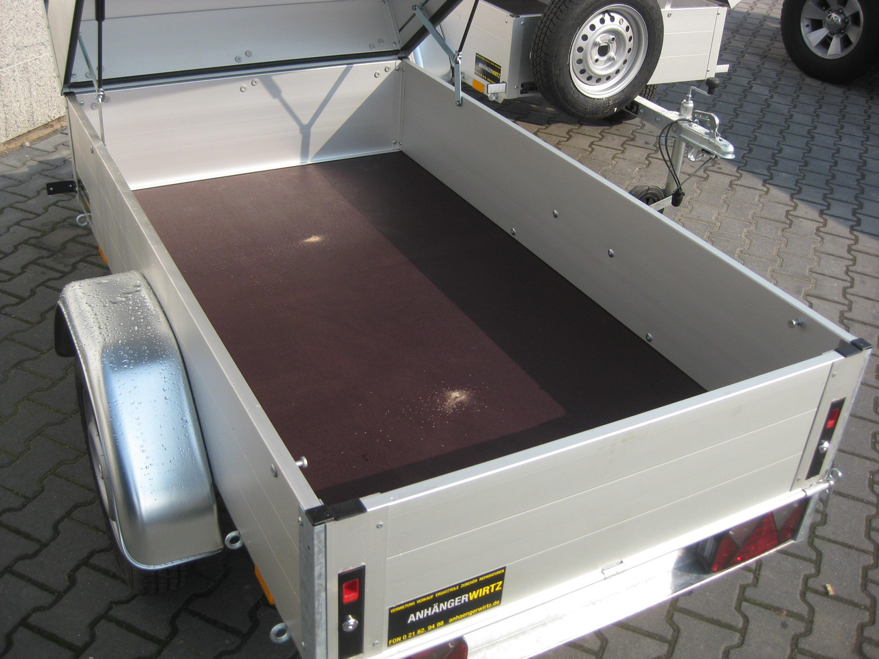 ALUBOXX Deckelanhänger GT 500 HT 181x101x48cm (XXS) 500kg - PKW Anhänger: das Bild 4 ALUBOXX Deckelanhänger GT 500 HT 181x101x48cm (XXS) 500kg - PKW Anhänger: das Bild 4