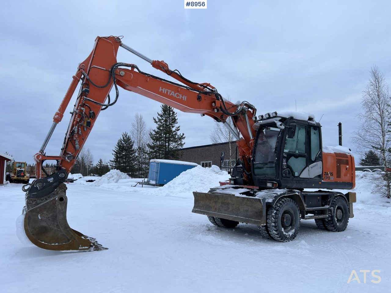 Hitachi ZX 170 W Wheeled excavator with tipper wagon and attachments - Mobilbagger: das Bild 1 Hitachi ZX 170 W Wheeled excavator with tipper wagon and attachments - Mobilbagger: das Bild 1