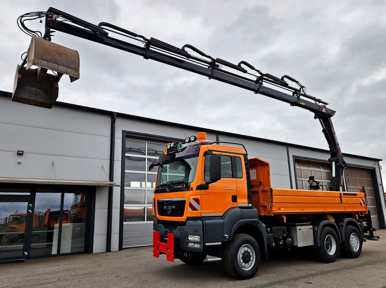 MAN TGS 28.360 6x4-4 HIAB 144E-4 Kran Euro5 - Kipper, Autokran: das Bild 1 MAN TGS 28.360 6x4-4 HIAB 144E-4 Kran Euro5 - Kipper, Autokran: das Bild 1