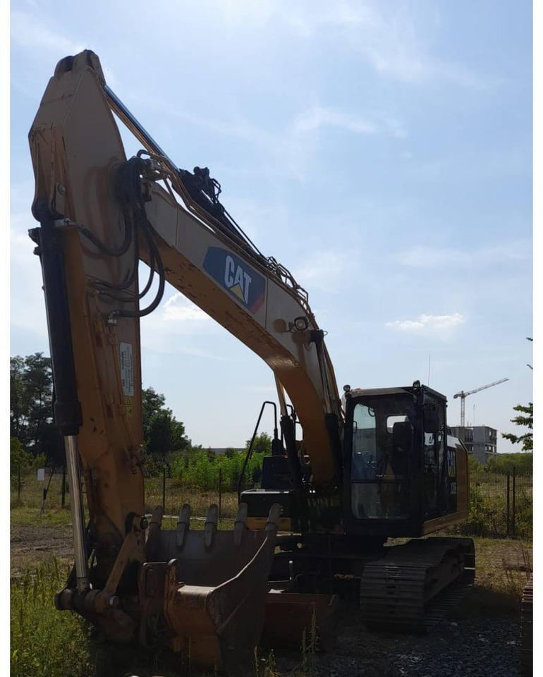 CAT 320EL - Kettenbagger: das Bild 1 CAT 320EL - Kettenbagger: das Bild 1