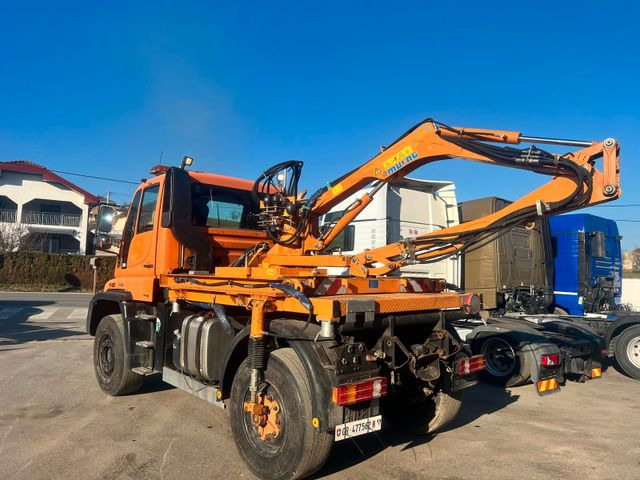 Unimog U500 4x4, Boeschungsmaehwerk Mulag - LKW: das Bild 1 Unimog U500 4x4, Boeschungsmaehwerk Mulag - LKW: das Bild 1