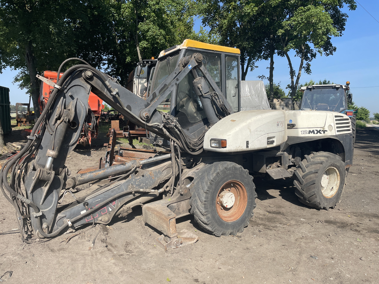 Mecalac 12MXT 12 MXT - części - kabina mosty siłowniki koła zwolnica skrzynia - Fahrantrieb für Landmaschine: das Bild 5 Mecalac 12MXT 12 MXT - części - kabina mosty siłowniki koła zwolnica skrzynia - Fahrantrieb für Landmaschine: das Bild 5