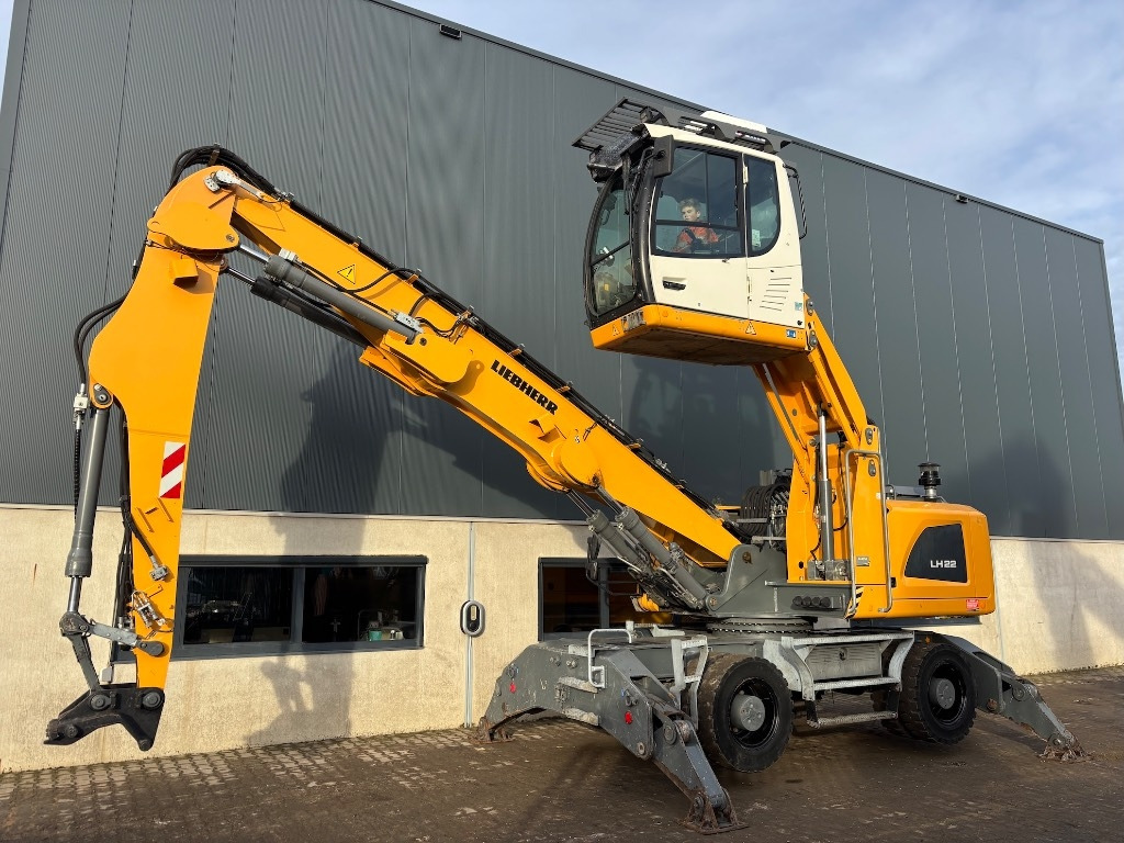 Liebherr LH 22 M - LH22 - LH22M - LH 24 - Umschlagbagger: das Bild 1 Liebherr LH 22 M - LH22 - LH22M - LH 24 - Umschlagbagger: das Bild 1