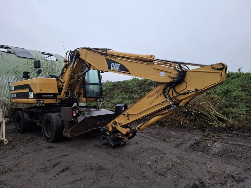Caterpillar M318 - Mobilbagger: das Bild 1 Caterpillar M318 - Mobilbagger: das Bild 1