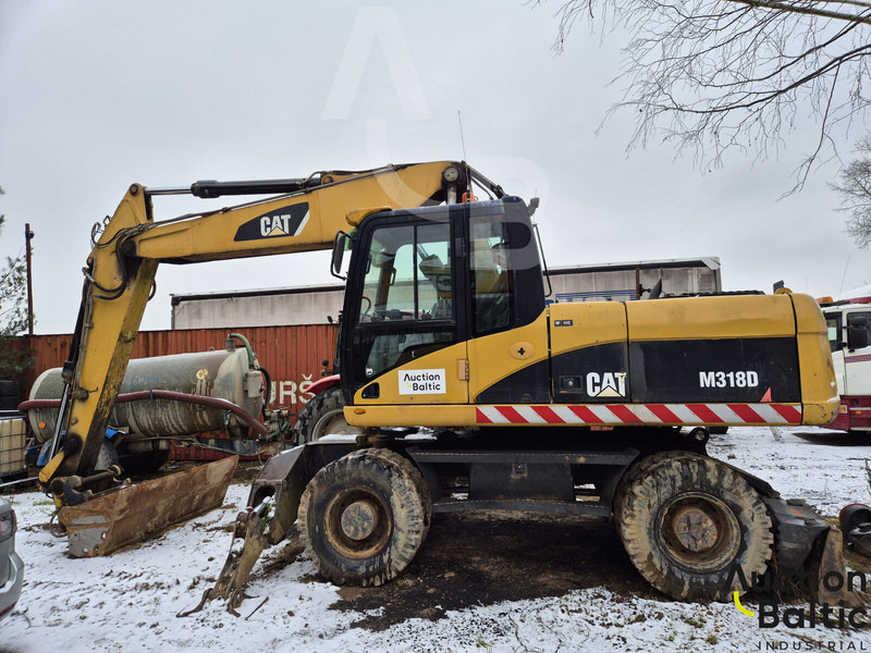 Caterpillar M 318 D - Mobilbagger: das Bild 1 Caterpillar M 318 D - Mobilbagger: das Bild 1