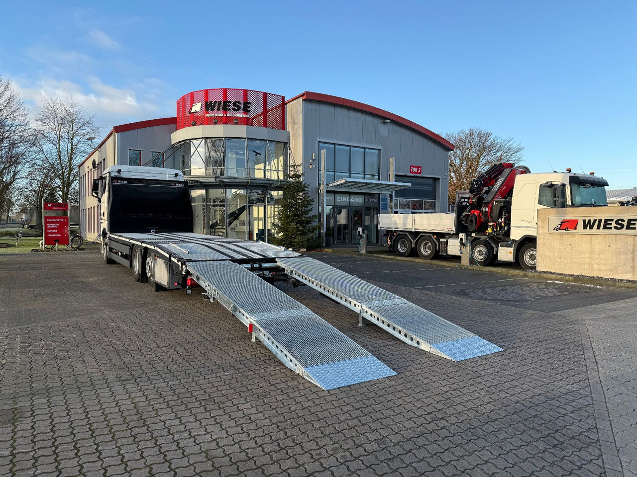MAN Baumaschinen- Arbeitsbühnentransporter Rampen - Pritsche LKW: das Bild 1 MAN Baumaschinen- Arbeitsbühnentransporter Rampen - Pritsche LKW: das Bild 1