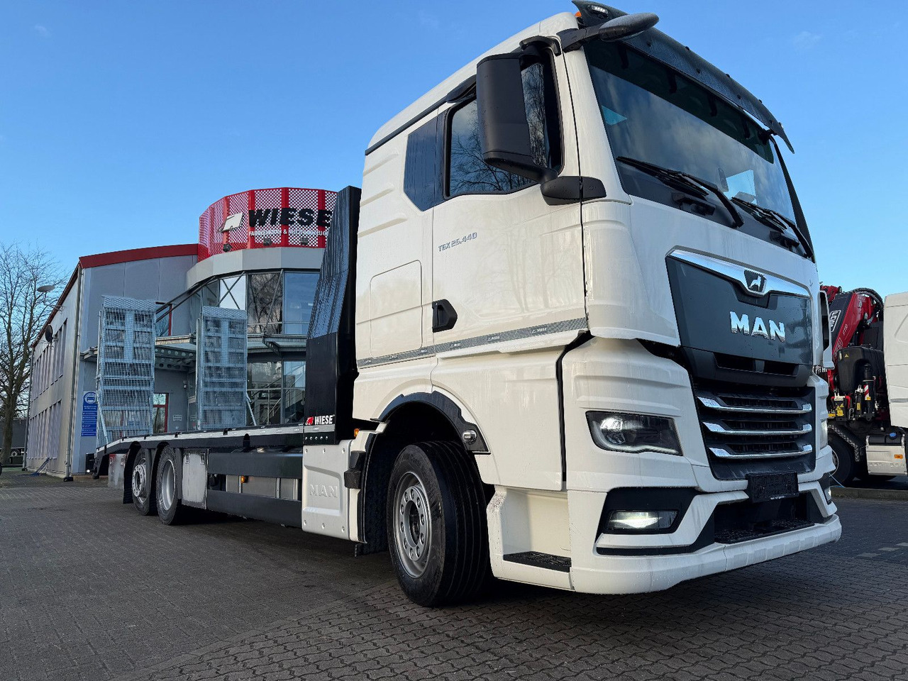 MAN Baumaschinen- Arbeitsbühnentransporter Rampen - Pritsche LKW: das Bild 2 MAN Baumaschinen- Arbeitsbühnentransporter Rampen - Pritsche LKW: das Bild 2