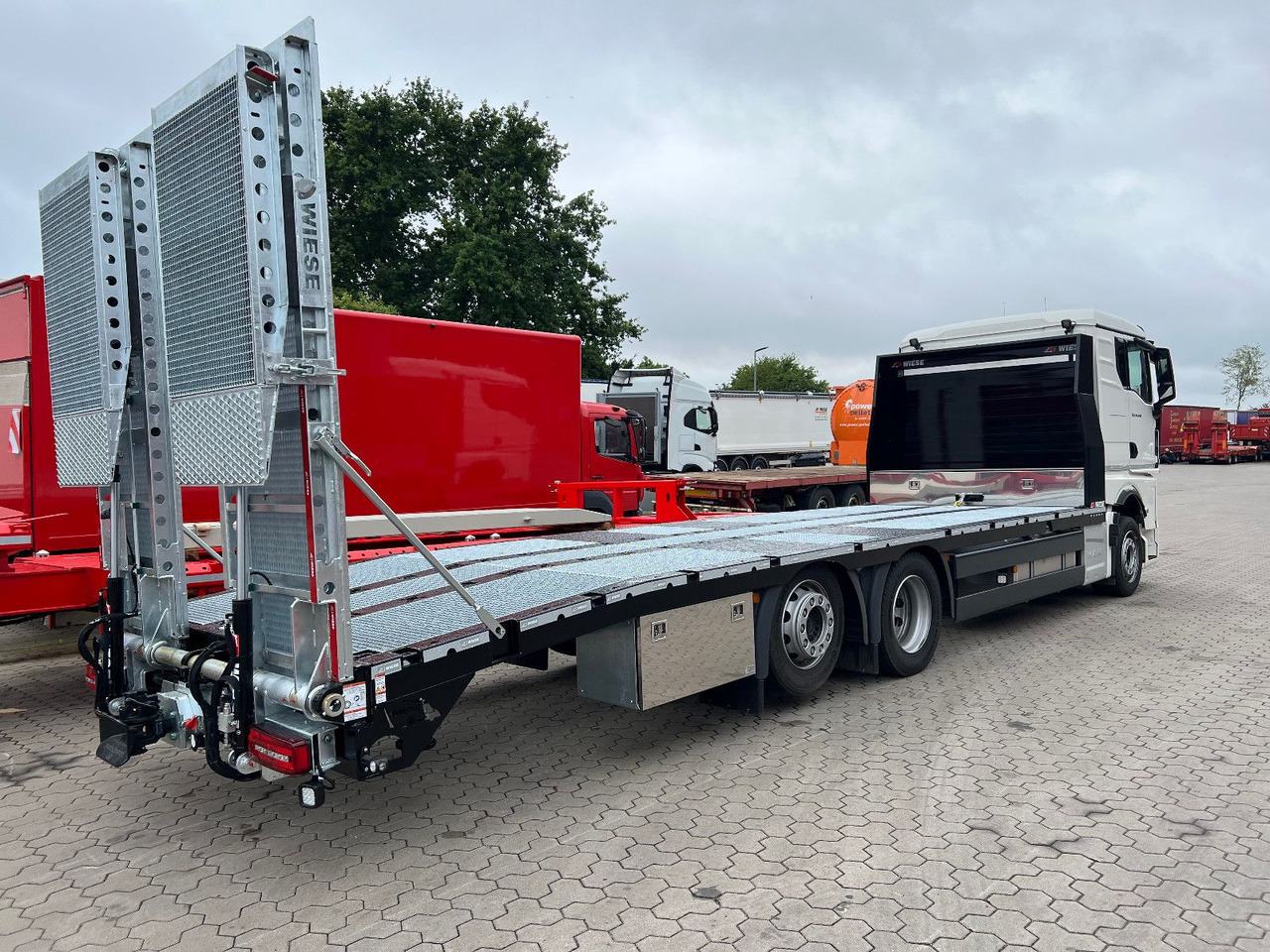 MAN Baumaschinen- Arbeitsbühnentransporter Rampen - Abschleppwagen: das Bild 2 MAN Baumaschinen- Arbeitsbühnentransporter Rampen - Abschleppwagen: das Bild 2
