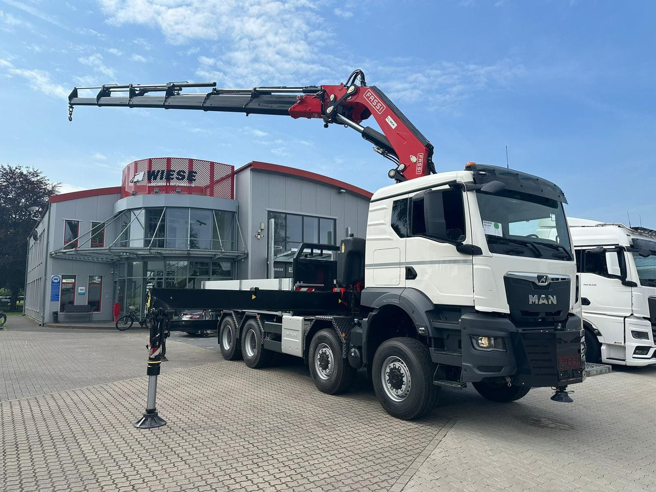 MAN TGS 41.520 8x8 mit Fassi Ladekran F710RA.2.26 - Pritsche LKW: das Bild 1 MAN TGS 41.520 8x8 mit Fassi Ladekran F710RA.2.26 - Pritsche LKW: das Bild 1