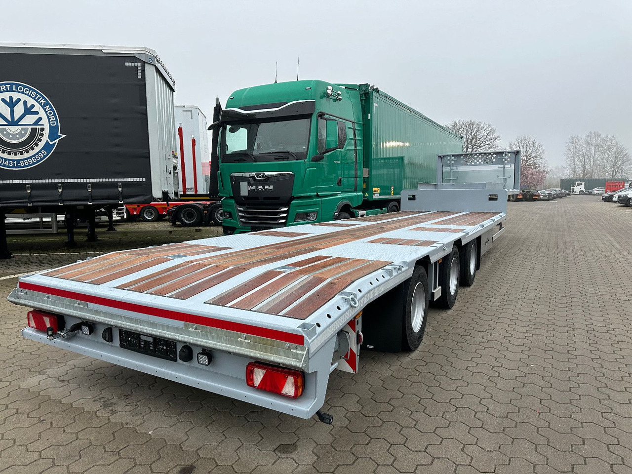 Tieflader Zwangslenkung Betonteile Fertigteile - Tieflader Auflieger: das Bild 4 Tieflader Zwangslenkung Betonteile Fertigteile - Tieflader Auflieger: das Bild 4