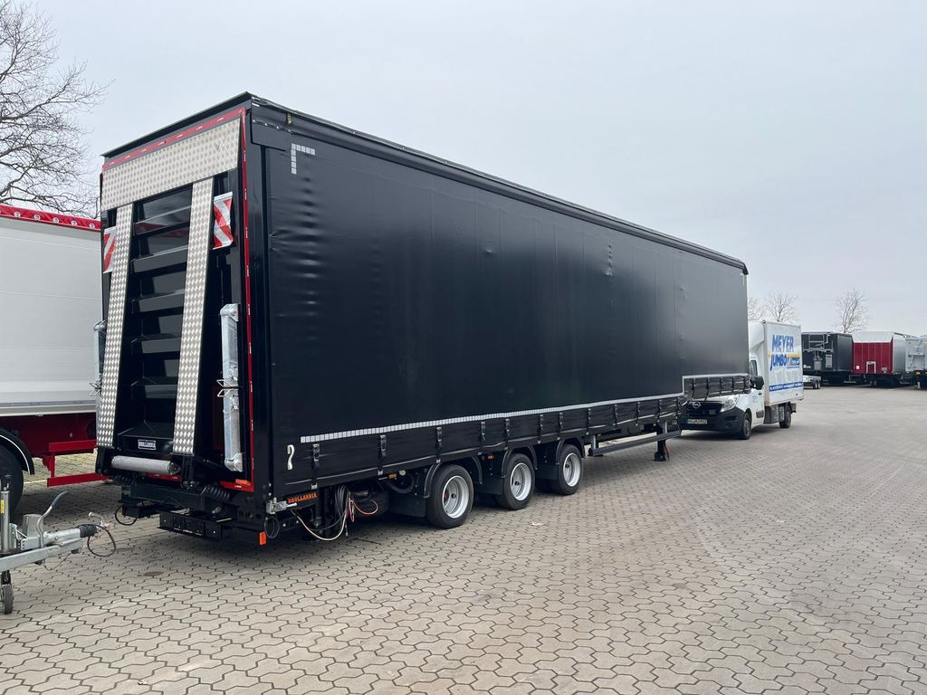 Wiese Gabelstaplertransporter Mega mit Rampen - Tieflader Auflieger: das Bild 1 Wiese Gabelstaplertransporter Mega mit Rampen - Tieflader Auflieger: das Bild 1