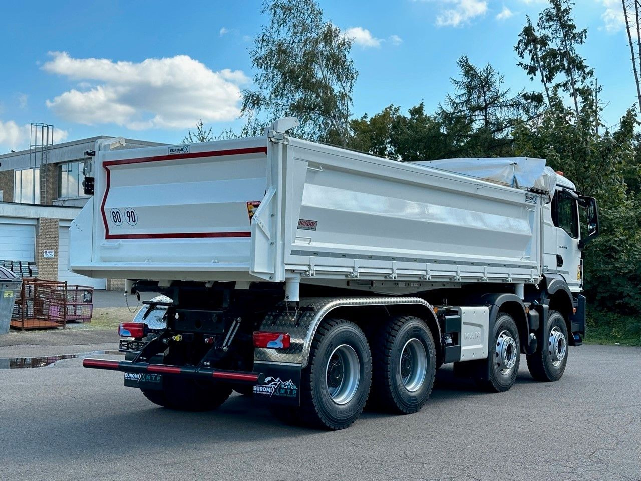 MAN TGS 41.440 8x4 EuromixMTP 3-Seiten-Kipper - Kipper: das Bild 4 MAN TGS 41.440 8x4 EuromixMTP 3-Seiten-Kipper - Kipper: das Bild 4
