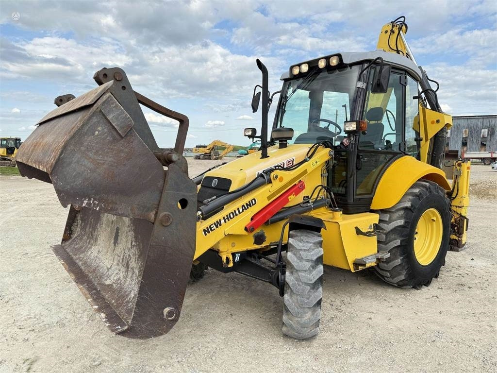 New Holland LB 110 B-4PT - Baggerlader: das Bild 1 New Holland LB 110 B-4PT - Baggerlader: das Bild 1