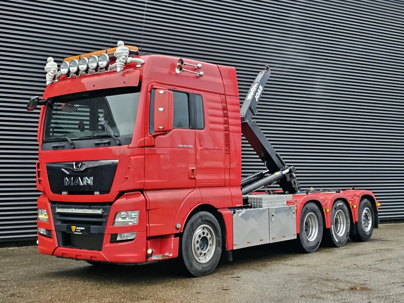 MAN TGX 35.500 / 8x4-4 / HOOKLIFT / ABROLL-KIPPER - Abrollkipper: das Bild 1 MAN TGX 35.500 / 8x4-4 / HOOKLIFT / ABROLL-KIPPER - Abrollkipper: das Bild 1