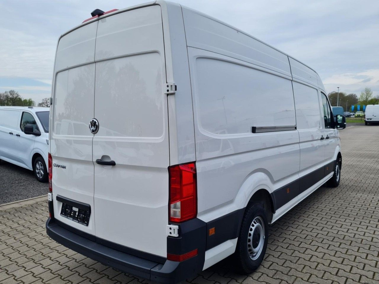 Volkswagen Crafter 35 Kasten lang L4H2 KLIMA NAVI_APP HOLZB Volkswagen Crafter 35 Kasten lang L4H2 KLIMA NAVI_APP HOLZB - Kastenwagen: das Bild 4 Volkswagen Crafter 35 Kasten lang L4H2 KLIMA NAVI_APP HOLZB Volkswagen Crafter 35 Kasten lang L4H2 KLIMA NAVI_APP HOLZB - Kastenwagen: das Bild 4