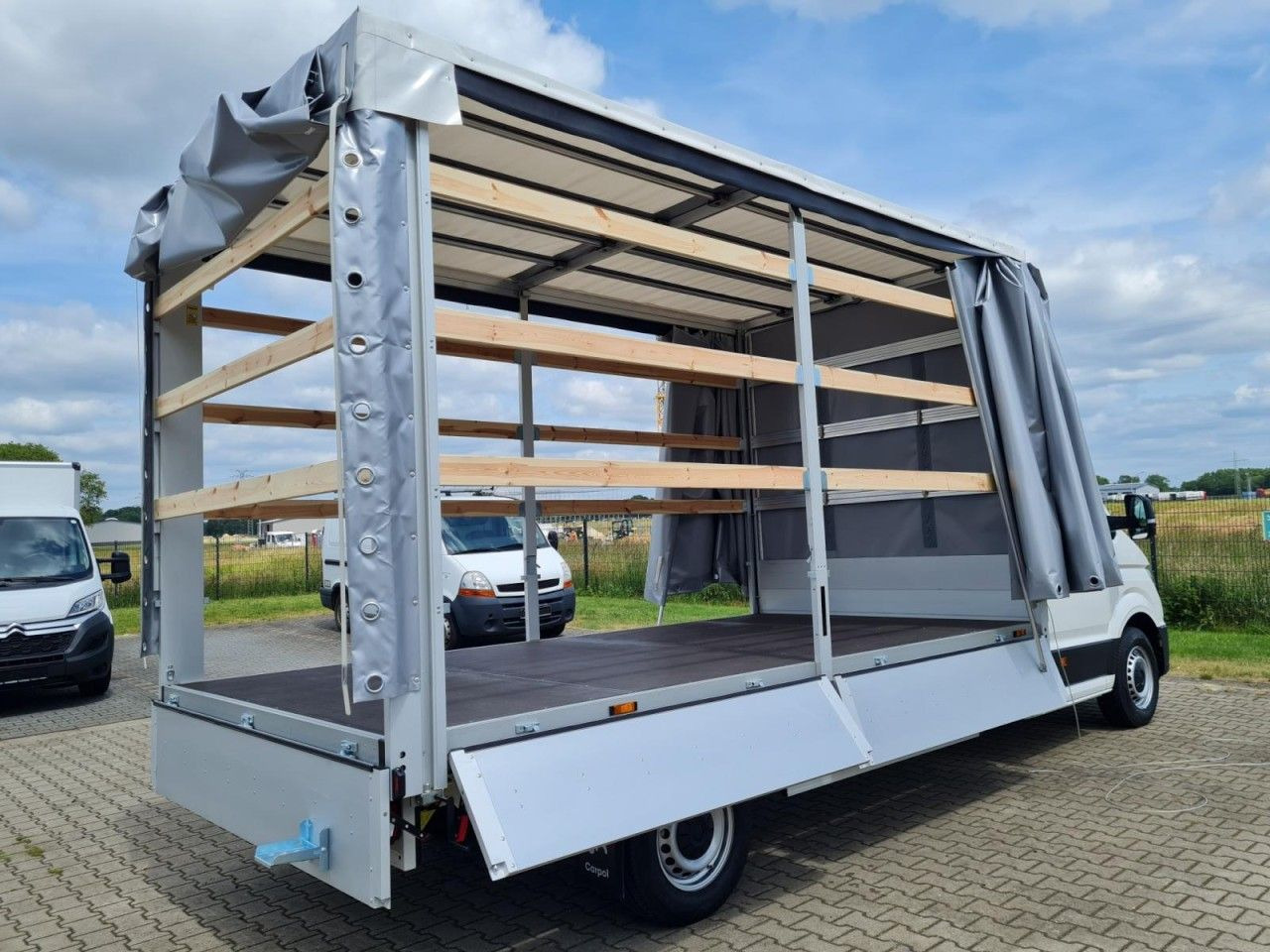 Volkswagen Crafter 35 TDI Pritsche Schiebe Plane LED TEMPOM - Planen Transporter: das Bild 5 Volkswagen Crafter 35 TDI Pritsche Schiebe Plane LED TEMPOM - Planen Transporter: das Bild 5