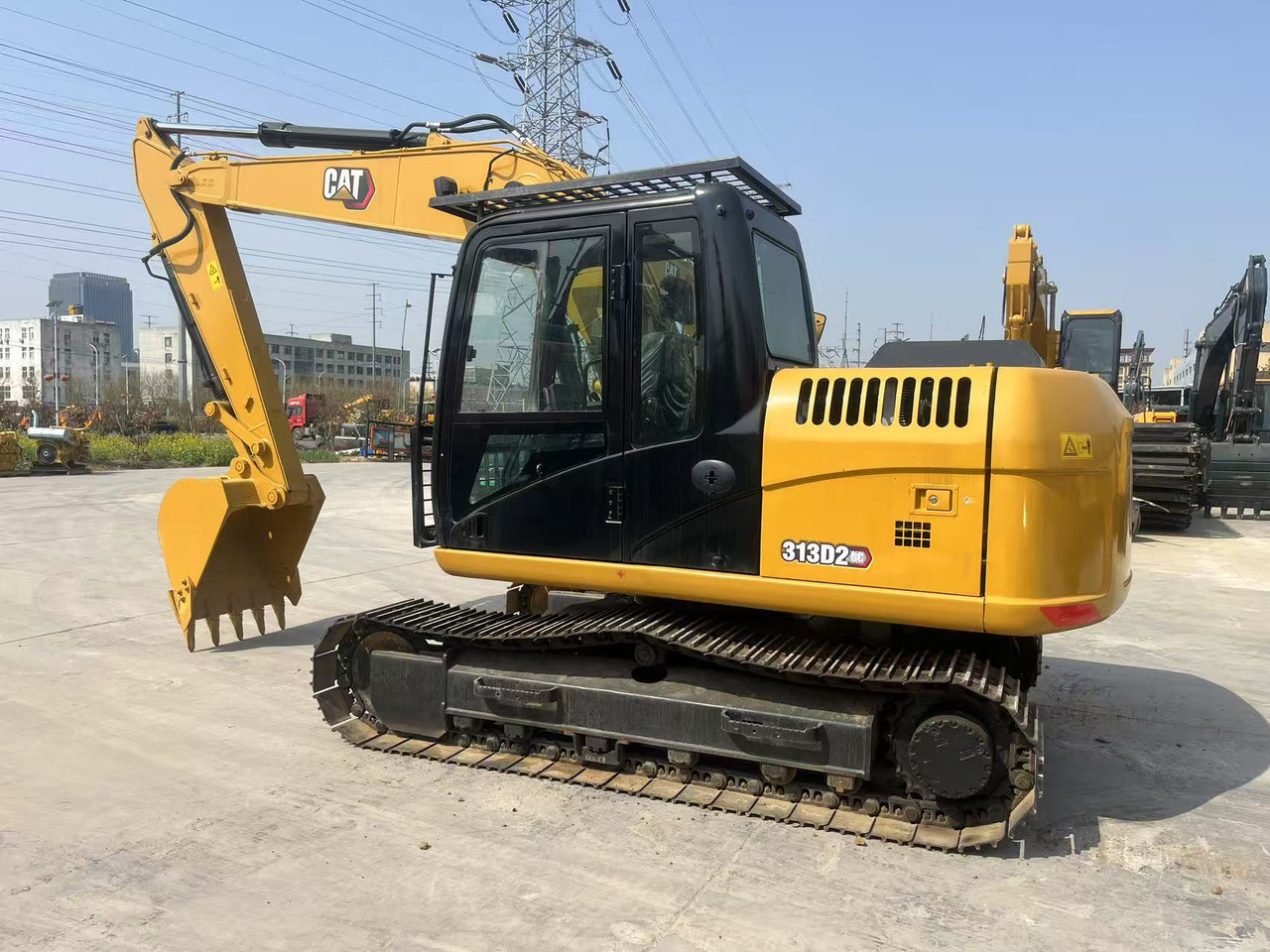 Caterpillar 313D2 - Kettenbagger: das Bild 2 Caterpillar 313D2 - Kettenbagger: das Bild 2