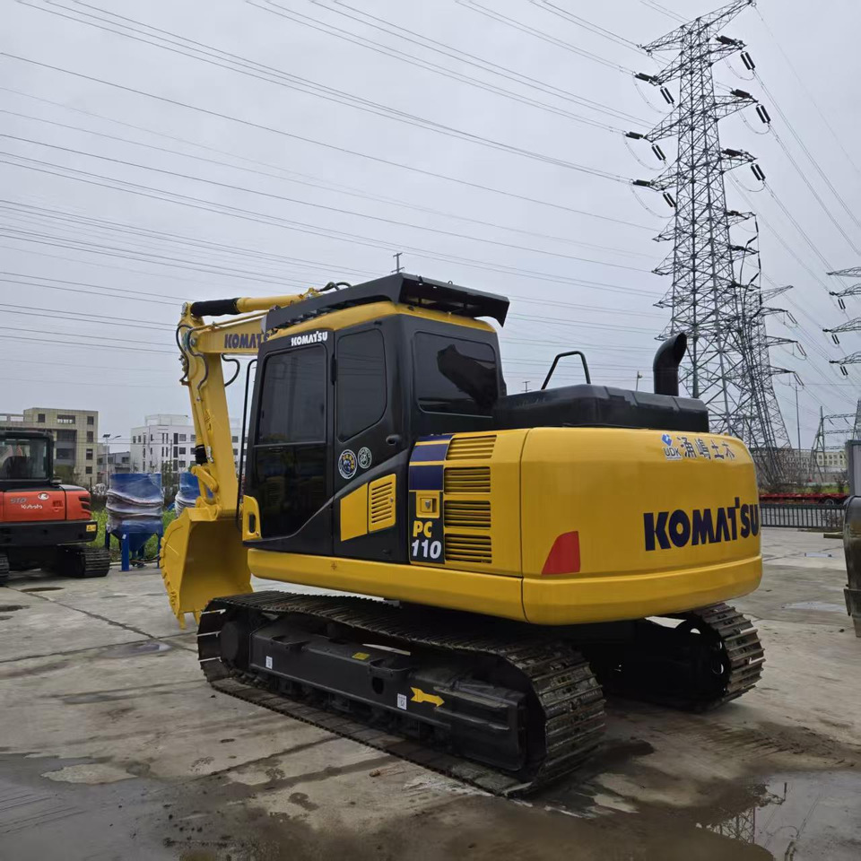 Bagger KOMATSU PC110: das Bild 7 Bagger KOMATSU PC110: das Bild 7