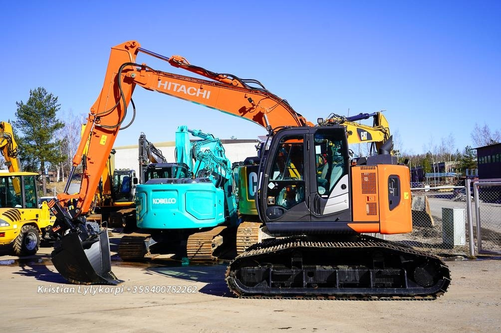 Hitachi ZX135US-6 METSÄALUSTALLA - Kettenbagger: das Bild 1 Hitachi ZX135US-6 METSÄALUSTALLA - Kettenbagger: das Bild 1