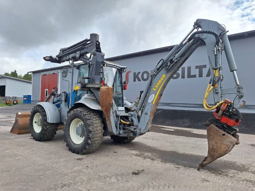 Lännen 8600G NOSTIN, HENKILÖKORI, PYÖRITTÄJÄ YM. - Baggerlader: das Bild 2 Lännen 8600G NOSTIN, HENKILÖKORI, PYÖRITTÄJÄ YM. - Baggerlader: das Bild 2