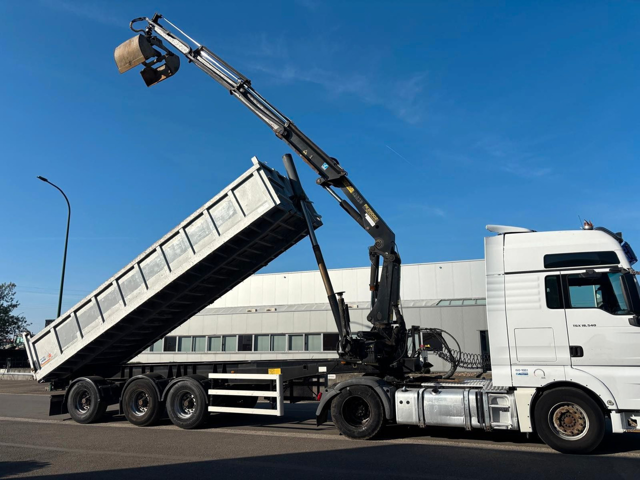 MAN TGX 18.540. Kipper + Kran PK20002. - Autokran: das Bild 3 MAN TGX 18.540. Kipper + Kran PK20002. - Autokran: das Bild 3