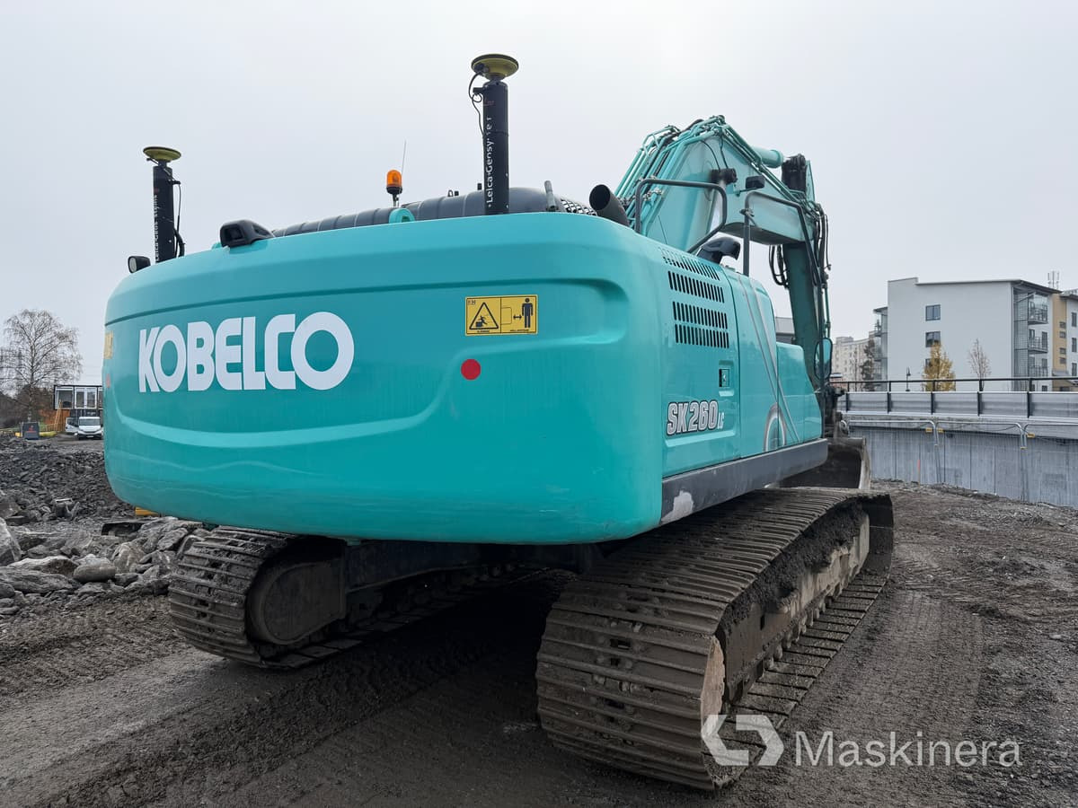 Grävmaskin Kobelco SK260LC-10 - Kettenbagger: das Bild 5 Grävmaskin Kobelco SK260LC-10 - Kettenbagger: das Bild 5