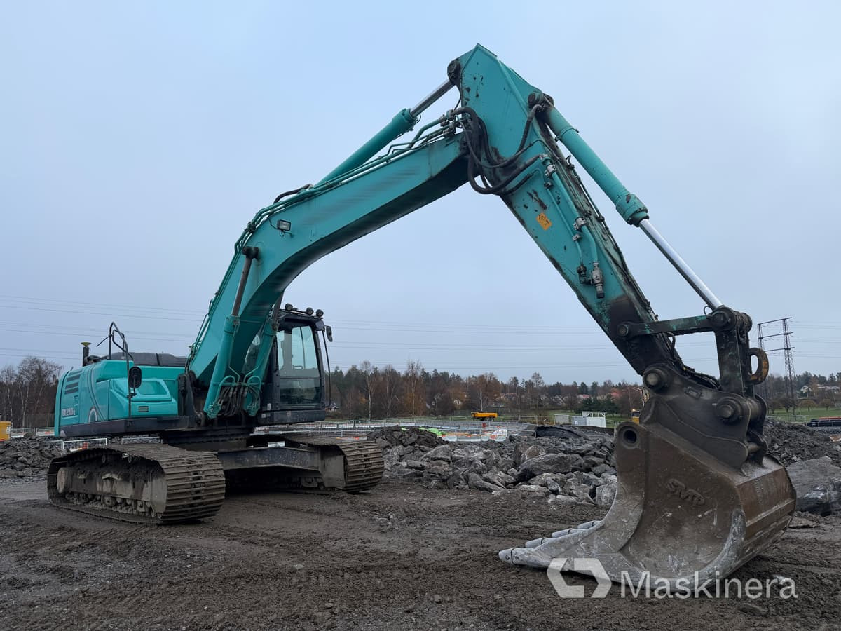 Grävmaskin Kobelco SK260LC-10 - Kettenbagger: das Bild 3 Grävmaskin Kobelco SK260LC-10 - Kettenbagger: das Bild 3